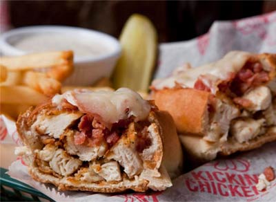 Kickin' Chicken: a tasty sandwich, fries and pickle